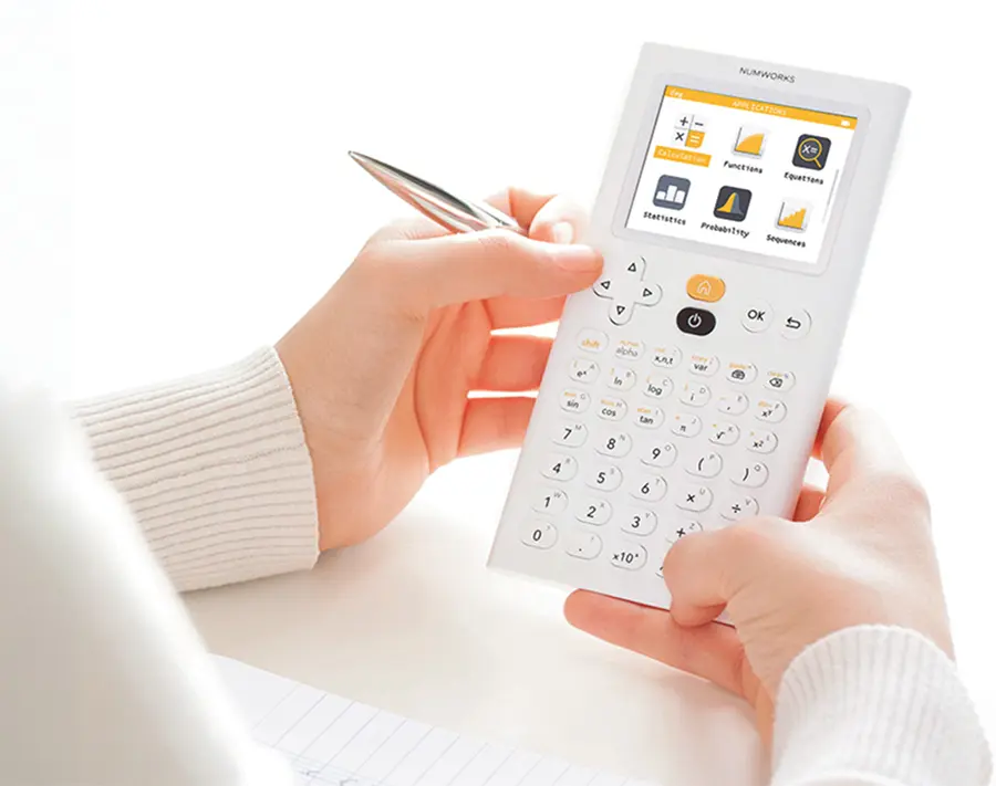 The graphing calculator in hands of an exam student